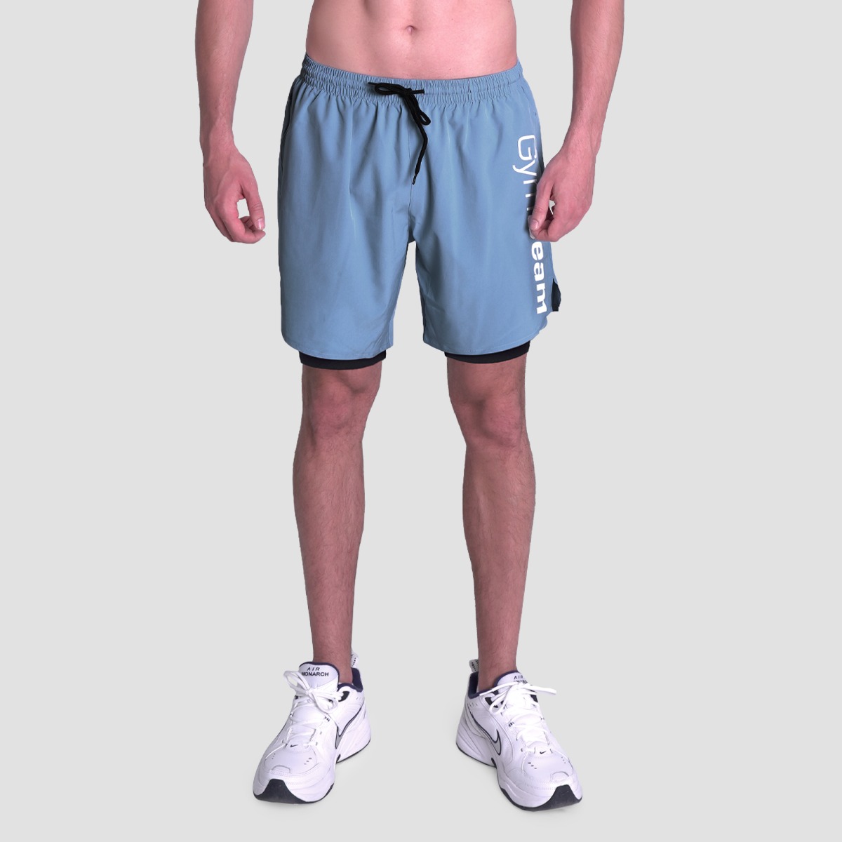2 en 1, short Essence, couleur bleu - GymBeam.