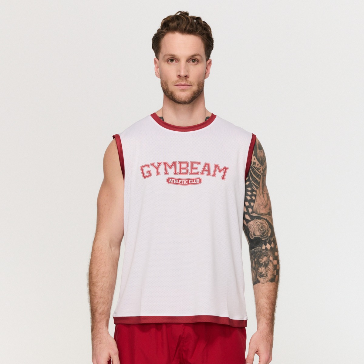 T-shirt sans manches style universitaire pour hommes – Blanc – GymBeam.