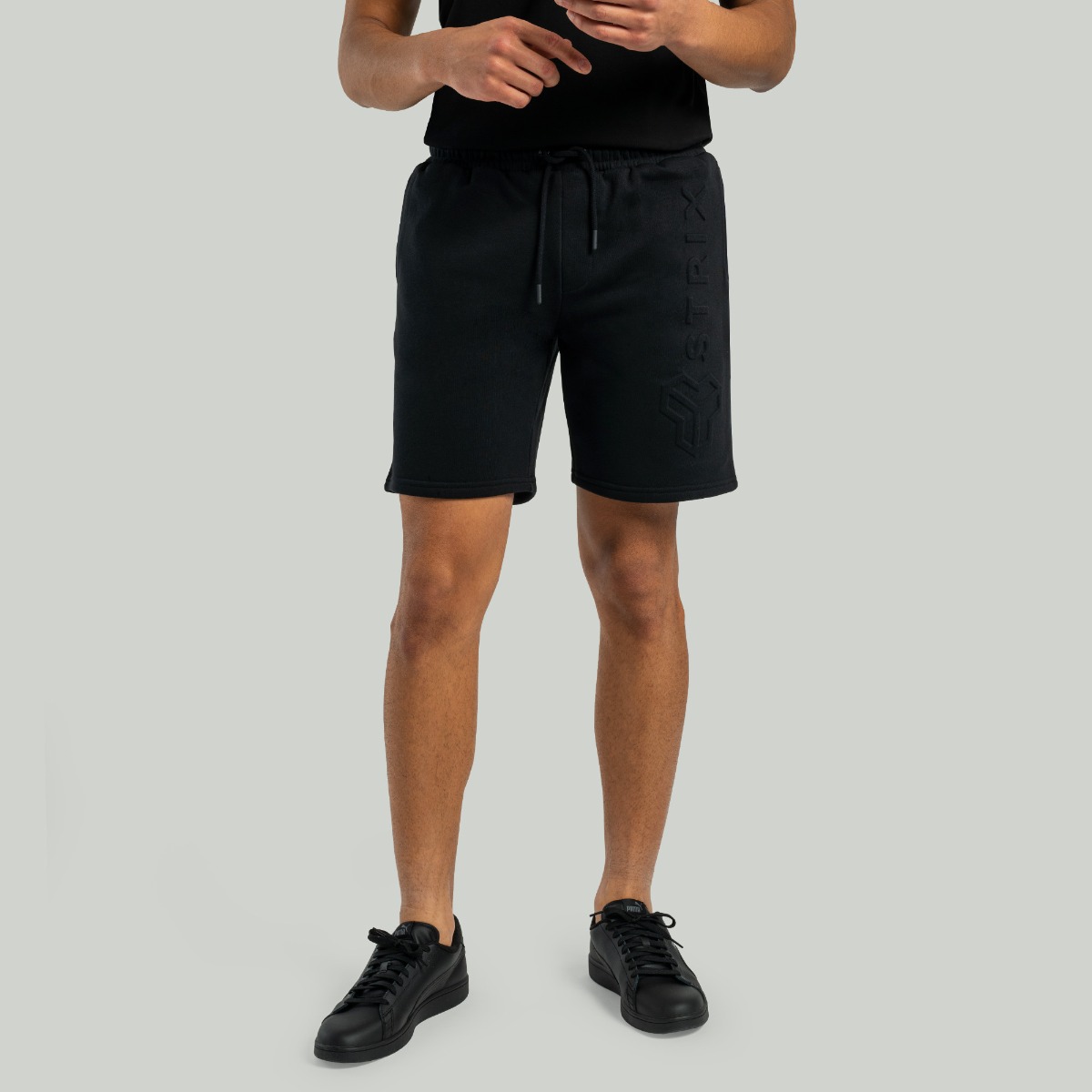 Shorts noirs à motif en relief - STRIX