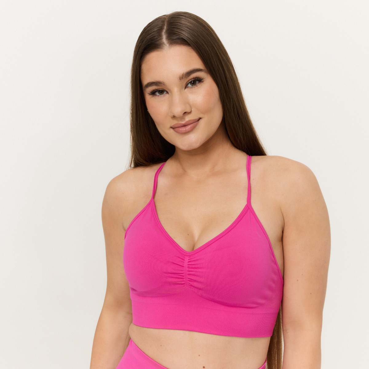 Soutien-gorge de sport Sculpt Seamless Rose - GymBeam.