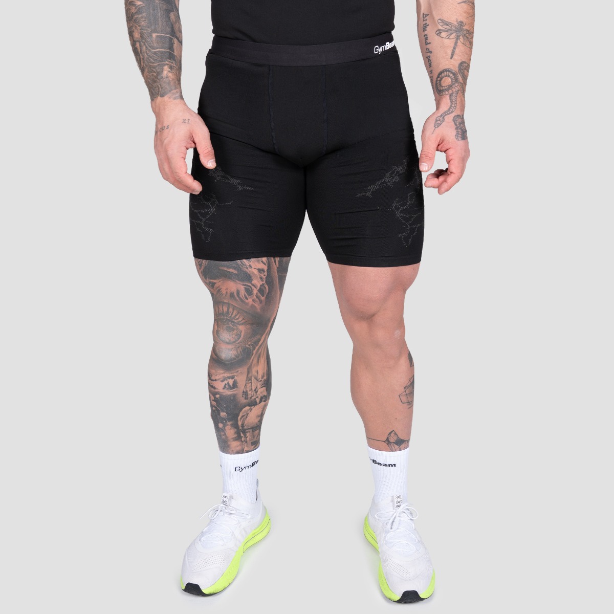 Shorts de sport unisexe, coupe ajustée, couleur noire - GymBeam.