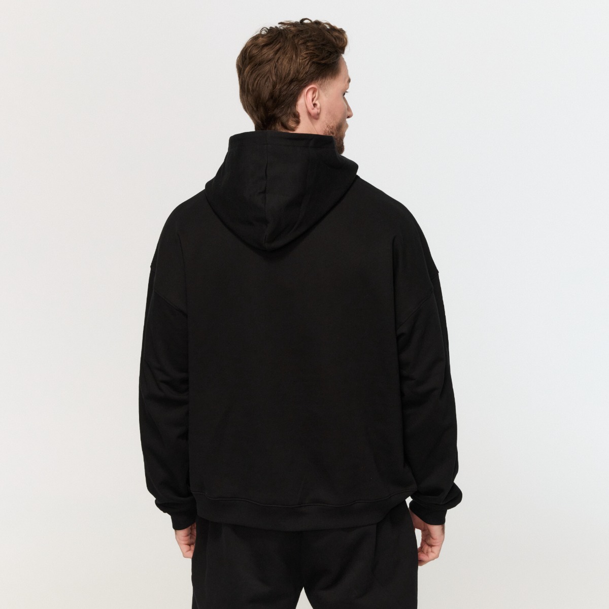 Sweat à capuche Varsity Noir - GymBeam