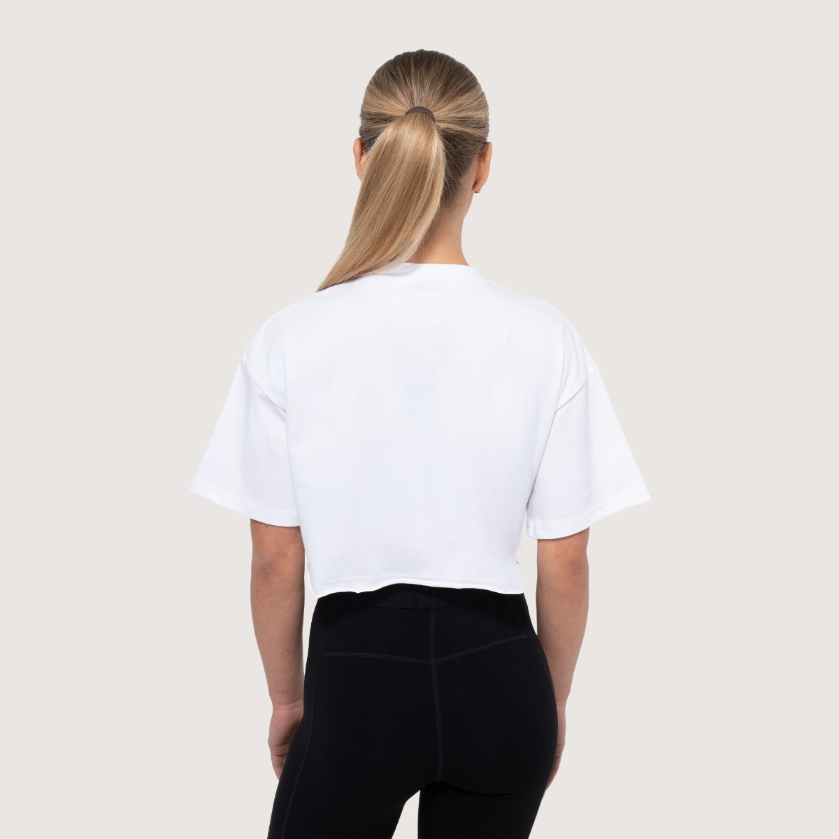 T-shirt court pour femmes, modèle Earned, couleur blanche - GymBeam.